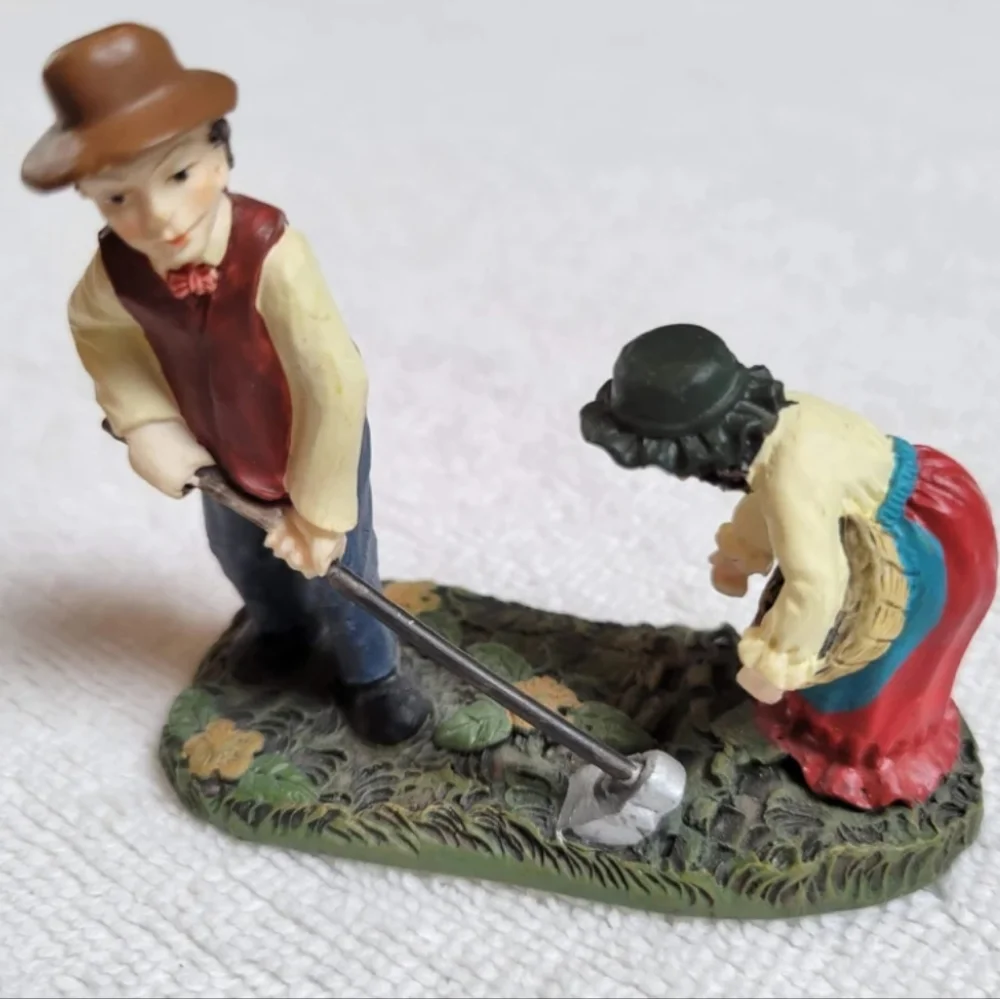 New Lang and Wise Meadowbrook Farm Man and woman planting